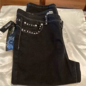 Black capris jeans by style and company.  Still have tags.  Never worn.  Size 14